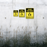 Portrait Round Plus Close The Door Children At Play Wall or Door Sign | Children Safety Signs