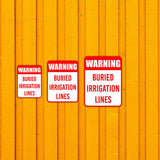 Portrait Round Plus Warning Buried Irrigation Lines Wall or Door Sign | Farm/Barn Warning Signage