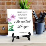 Rejoice In Hope, Be Patient In Tribulation, Be Constant In Prayer. Romans 12:12 5"x 5" Square Table Sign With Acrylic Easel | Religious Bible Quotes Decor