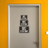 Classic Framed Plus Don't Grow Up IT's A Trap Wall or Door Sign | Funny Funny Home & Office Signage