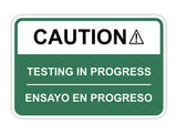 Classic Framed Plus Caution Testing In Progress Wall or Door Sign | Bilingual Spanish and English Workplace Safety Signage