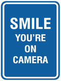 Signs ByLITA Portrait Round Smile you're on camera Sign - Laser-Engraved Lettering | Durable ABS Plastic | Vibrant Colors | Powerful Foam Tape