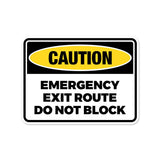 Classic Framed Plus Caution: Emergency Exit Route – Do Not Block Door or Wall Sign | Miscellaneous Warning Signs - Industrial & Construction