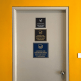 Signs ByLITA Square Loading and Unloading Area Wall or Door Sign | Spanish Bilingual Warehouse Signs
