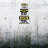 Classic Framed Plus Caution: Emergency Exit Route – Do Not Block Door or Wall Sign | Miscellaneous Warning Signs - Industrial & Construction