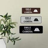 Standard Smile You're On Camera Wall or Door Sign