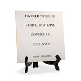 Hatred Stirs Up Strife, But Love Covers All Offenses. Proverbs 10:12 5"x 5" Square Table Sign With Acrylic Easel | Religious Bible Quotes