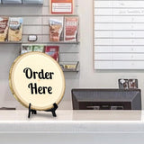 Customer Interaction Rustic Wood Discs – Natural Bark-Edge with a Sleek Black Acrylic Easel