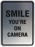 Signs ByLITA Portrait Round Smile you're on camera Sign - Laser-Engraved Lettering | Durable ABS Plastic | Vibrant Colors | Powerful Foam Tape