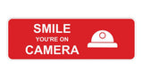 Standard Smile You're On Camera Wall or Door Sign