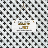 If You Haven't Grown Up By 50 You Don't Have To! 5x10 Hanging Plus Wall or Door Sign | Family and Friends Home Decor