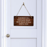 A Journey Of A Thousand Miles Must Begin With A Simple Step. 5x10 Hanging Plus Wall or Door Sign | Funny & Motivational Home Decor