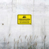 Classic Framed Plus Precaución: Montacargas en Operación — Wall or Door Sign | Spanish construction & safety - Sign
