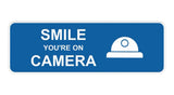 Standard Smile You're On Camera Wall or Door Sign