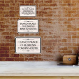 Classic Framed Plus Do Not Place Children’s Toys In Mouth Door or Wall Sign | Children's Warning and Safety Signs