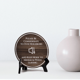 Please Be Considerate to Our Neighbors and Keep Noise to a Minimum When Leaving Circle Table Sign with Acrylic Stand (5x5") | Guest Neighbor Comfort Sign