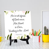 He Is Not Afraid Of Bad News; His Heart Is Firm, Trusting In The Lord. Psalm 112:7 5"x 5" Square Table Sign With Acrylic Easel | Religious Bible Quotes Decor