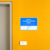 Classic Framed Plus Staff: Change Scrubs Daily to Maintain Hygiene Door or Wall Sign | Hygiene and Safety Signage