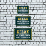 Classic Framed Plus Relax We're All Crazy. It's Not A Competition. Door or Wall Sign | Funny Home Decor