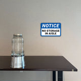Classic Framed Plus Notice No Storage In Aisle Door or Wall Sign | Health & Safety Signage
