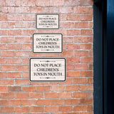 Classic Framed Plus Do Not Place Children’s Toys In Mouth Door or Wall Sign | Children's Warning and Safety Signs