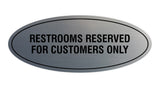 Oval Restrooms Reserved For Customers Only Sign