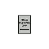 Portrait Round please use other door left arrow Sign with Adhesive Tape, Mounts On Any Surface, Weather Resistant